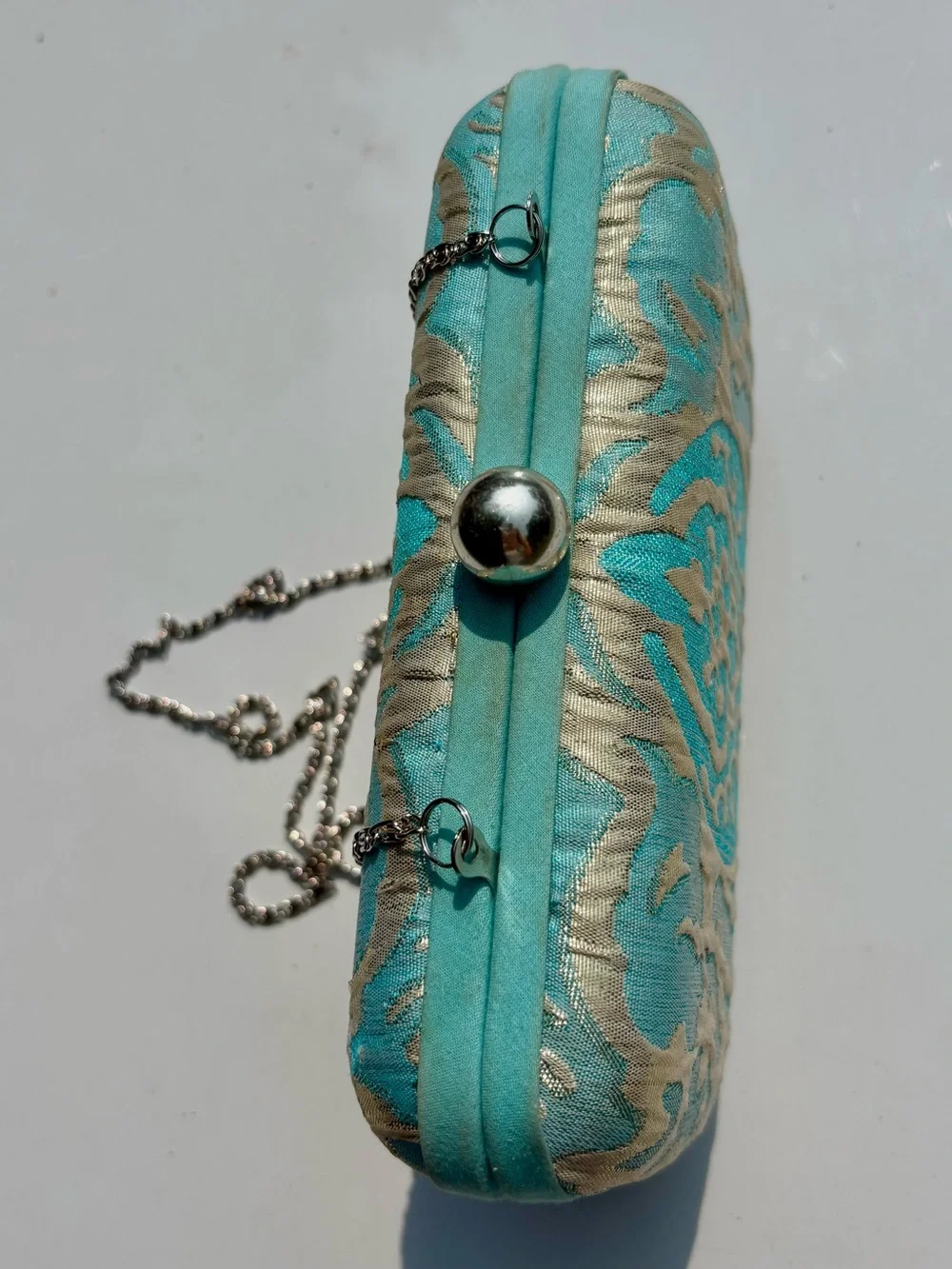Roberta Freymann Turquoise and Gold Embossed Clutch/Chain Crossbody- Kiss lock